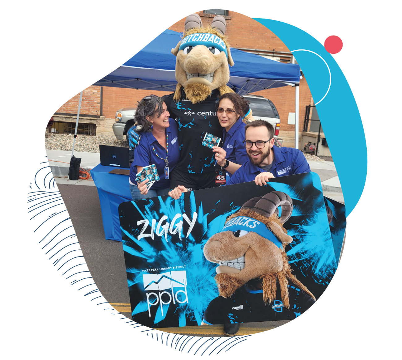 Library Staff with a Mascot named Ziggy